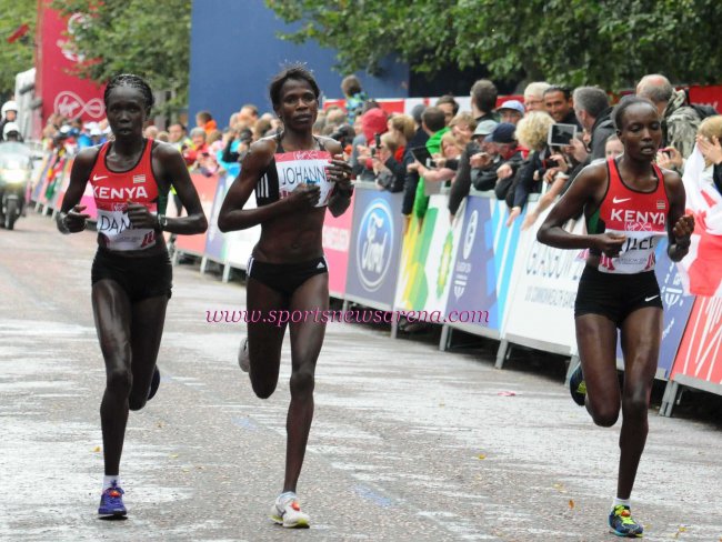 Kenyan marathoners Flomena Cheyech(left) and Caroline Kilel(right) compete in the women's marathon. 