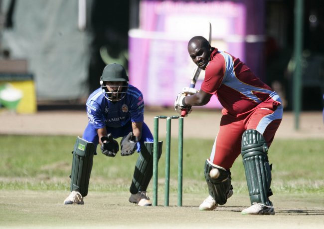 David Obuya bats under pressure from Swamibapa wicketkeeper Irfan Karim. (Photo by Shutterspeed)
