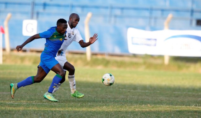 Rwanda's Bizimana Djihad against Libya Mohamed Amhimmid (Photo by Shutterspeed)